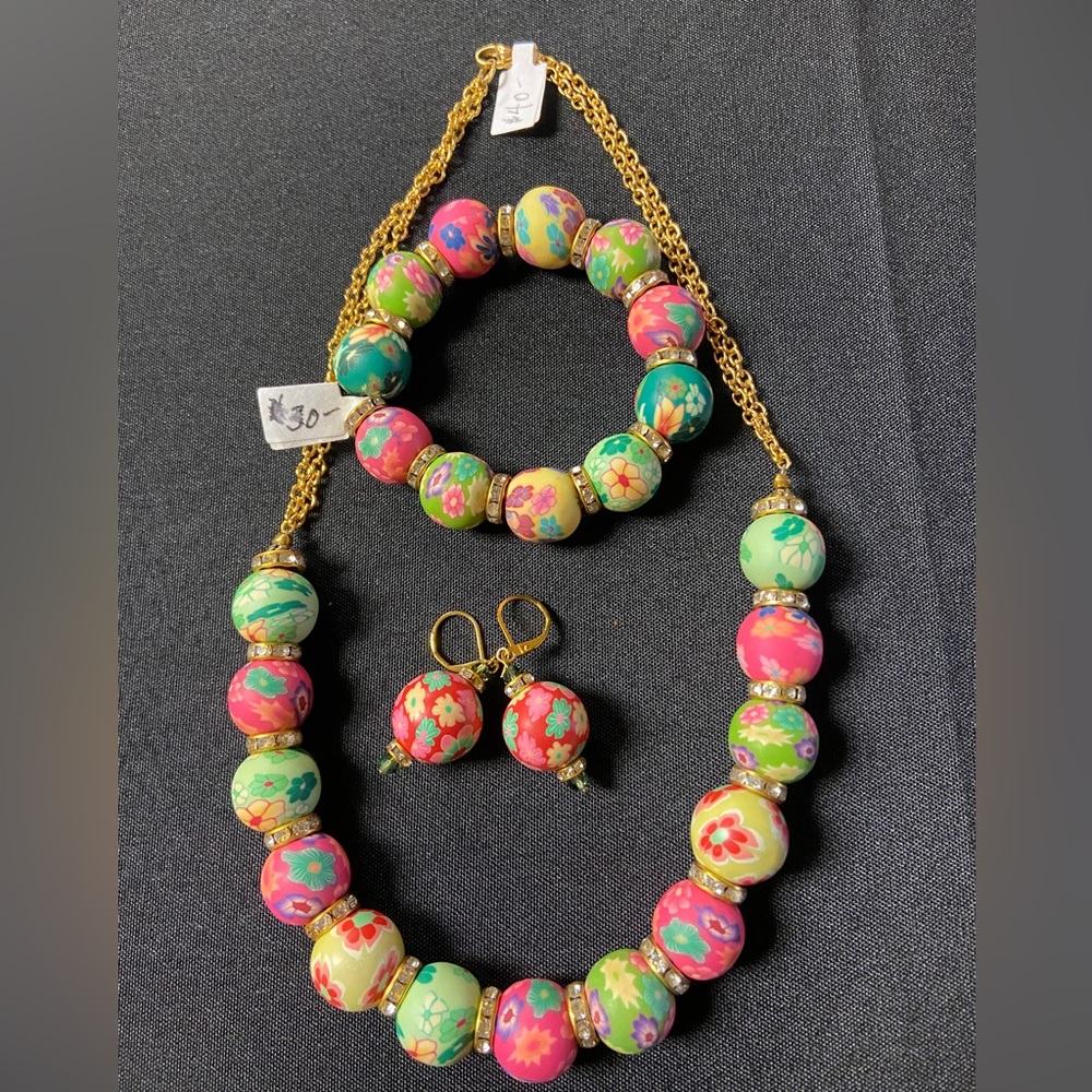 Earrings only. Colorful handmade jewelry. Necklace and bracelet are sold.
